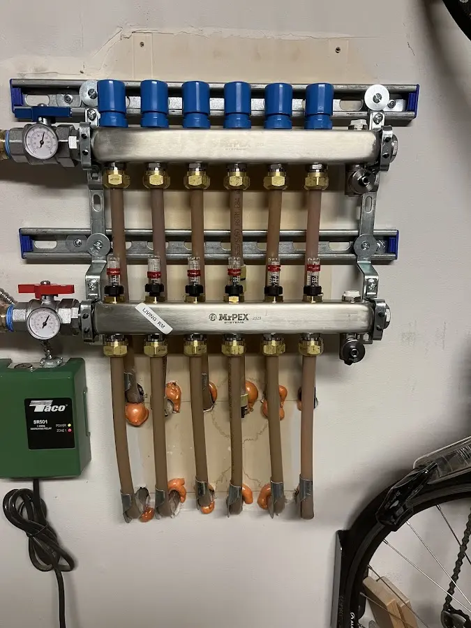 Plumber performing Water Heater Repair at a residential property in Progreso